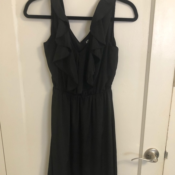 black dress and black suit Mugler // X H&M Black Mesh Asymmetrical Dress  VSP Consignment